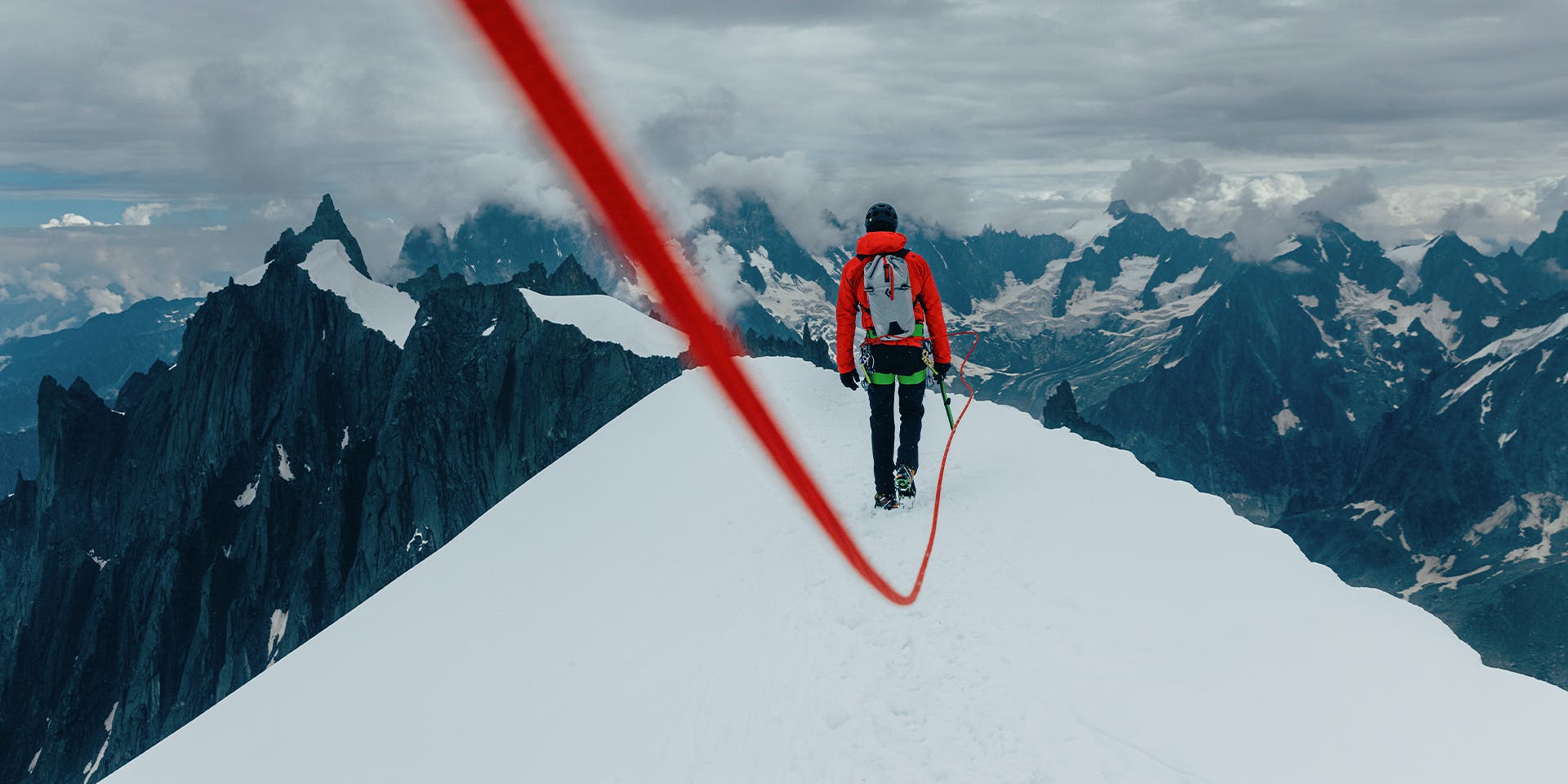 An image of a mountaineer on a snowy ridge 