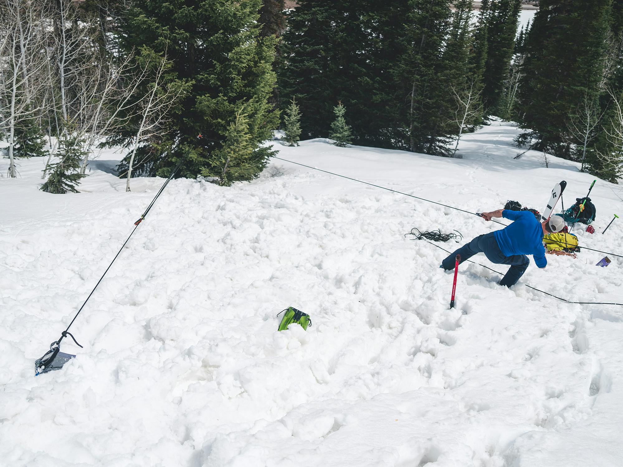 Matt Berry tests the snow anchor strength